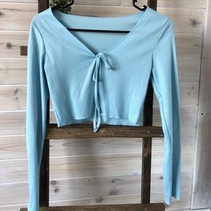 Light blue cropped-ish tie sweater